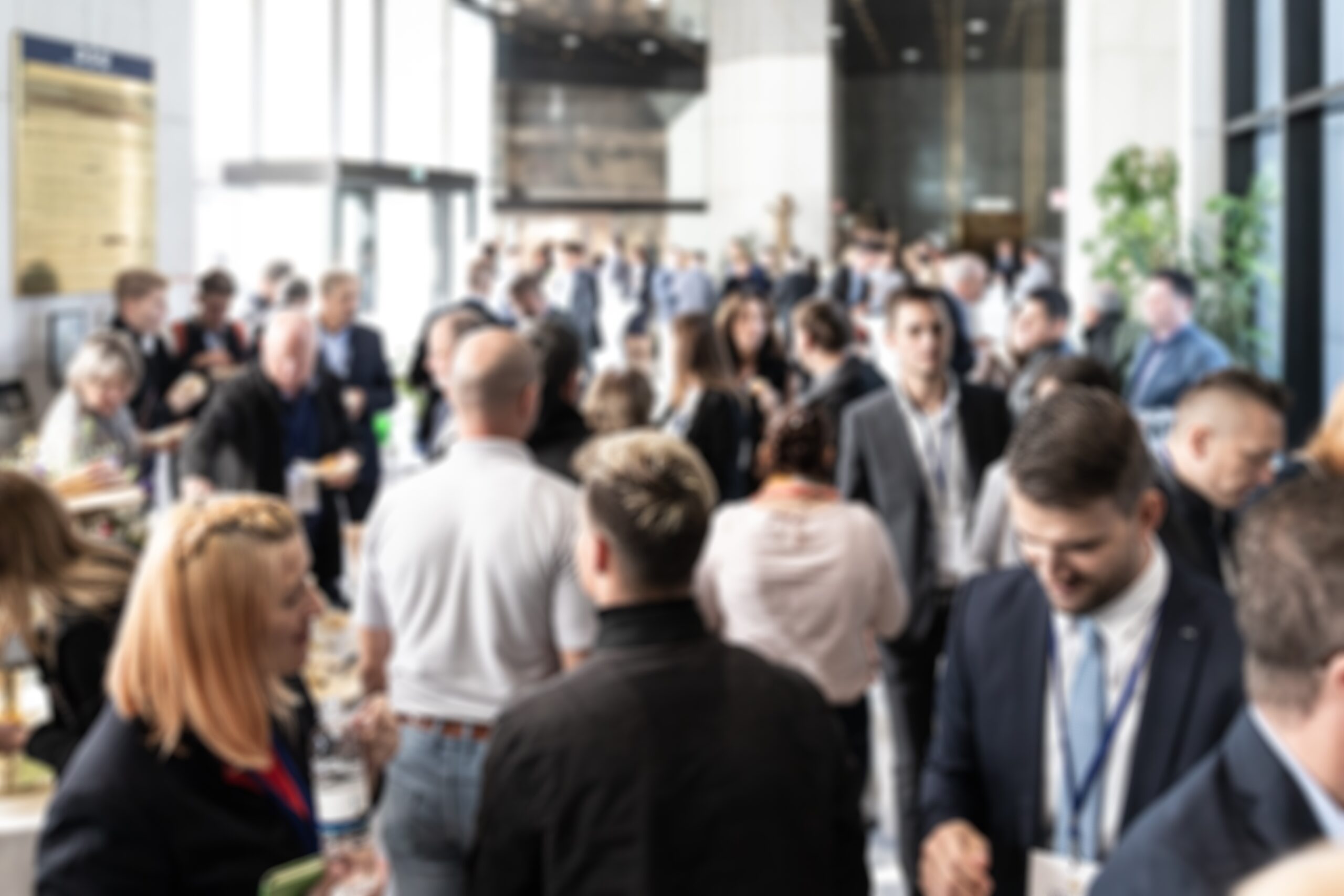 A crowd of people at a conference.