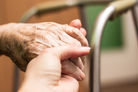 Two people holding hands.