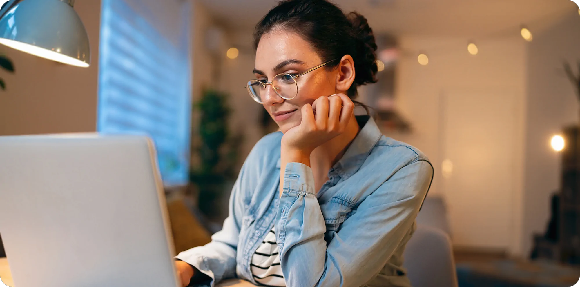 woman with glasses and computer